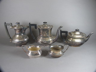 A 5 piece oval silver plated tea/coffee service comprising teapot,  coffee pot, hotwater jug, twin handled sugar bowl and cream jug