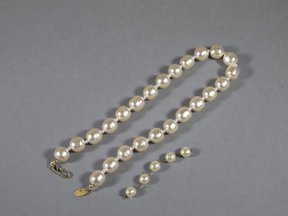 A string of simulated pearls