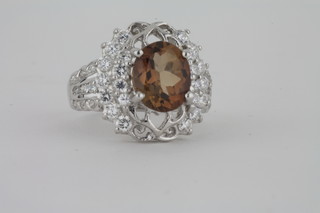A silver dress ring set a champagne topaz approx 5ct