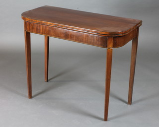 A 19th Century mahogany D shaped card table, raised on square tapering supports 36"w x 17"w x 29"h