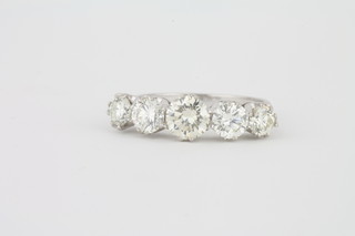 An 18ct white gold dress ring set 5 diamonds, approx 1.87ct