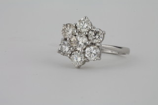A lady's 18ct white gold cluster dress ring set diamonds approx  2.30ct