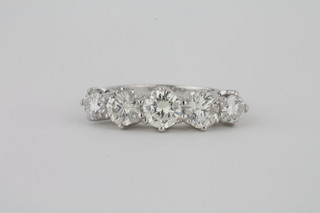 A lady's 18ct white gold engagement/dress ring set 5 diamonds,  approx 2.15ct
