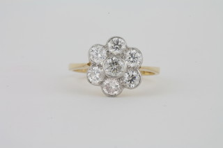 An 18ct yellow gold cluster ring set diamonds, approx 1.50ct
