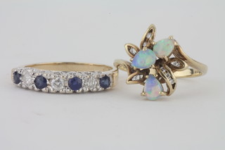 A 9ct gold half eternity ring set sapphires and diamonds together  with a 9ct gold dress ring set opals and diamonds