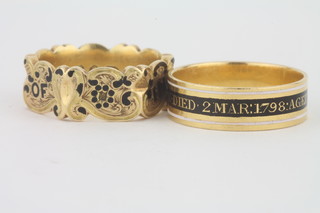A Georgian 18ct gold enamelled mourning ring marked Richard Wilkinson died 2nd March 1798 aged 42 and a Victorian 18ct  gold and enamelled mourning ring marked In Memory of R T  Atkinson 9th March 1843 aged 38