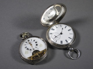 A key wind open faced pocket watch with enamelled dial and Roman numerals contained in a fine silver case and 1 other open  faced pocket watch - f,