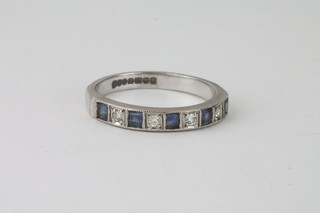 A lady's 18ct white gold half eternity ring set sapphires and  diamonds
