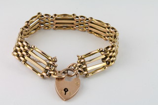 A gilt metal gate bracelet