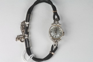A Bulova lady's cocktail wristwatch contained in a 14ct white  gold case set diamonds