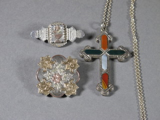 A "silver" and polished hardstone cross and 2 Victorian silver  and gold brooches