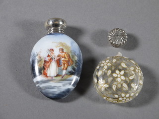 A Continental porcelain oval scent bottle decorated a romantic scene with silver lid and a glass scent bottle with silver lid and  floral enamelled decoration - bottle f,