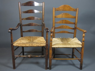 Two 18th Century ladderback elbow chairs with rush seats on turned legs