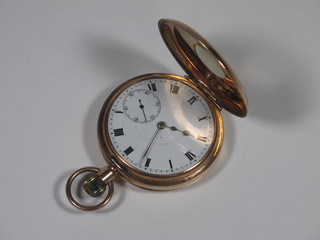 A 9ct gold half hunter keyless pocket watch, having Roman  enamelled dial set second subsidiary dial, lever movement, the  inner case inscribed Arthur from Denny 23 September 1924   ILLUSTRATED