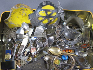 A collection of silver and plated souvenir spoons together with silver brooches etc