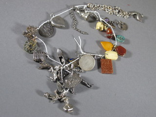 A collection of charm bracelets and charms