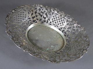 A mid 19th Century Dutch silver reticulated basket decorated in  the French taste with roses and open lattice cartouches 12 ozs