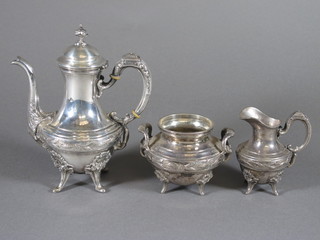 A 19th Century French silver 3 piece bachelor's tea service comprising teapot, sucrier and creamer, decorated bands of  laurel, raised on scrolled splayed legs 14 ozs