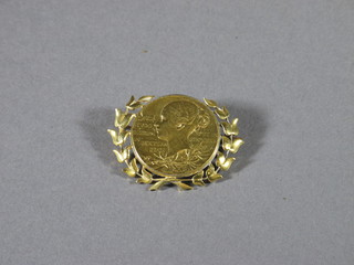 A gilt metal brooch to commemorate Queen Victoria's Diamond Jubilee