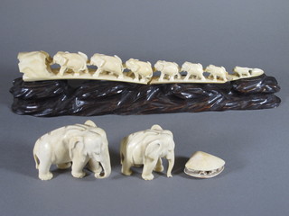 A carved ivory bridge of elephants 14", f and r, 2 carved ivory  figures of elephants 3" and a carved ivory clam shell - the base  with signature mark 2"