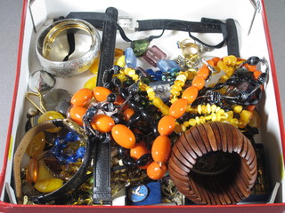 An oak box of costume jewellery