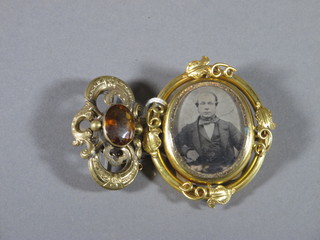 A pinch beck double sided mourning brooch and 1 other pinch  beck brooch