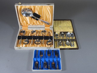 A 7 piece silver plated dessert service with serving spoon and 6 spoons, a set of 6 silver plated pastry forks and other cased  teaspoons etc