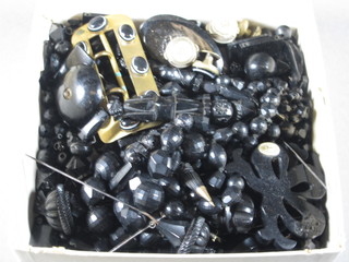 A collection of various jet beads etc