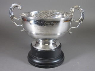 A silver plated twin handled trophy cup 10"