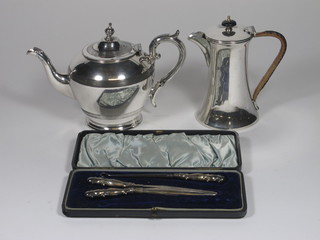 A silver plated hotwater jug, do. teapot, pair of silver handled  glove stretchers and a button hook