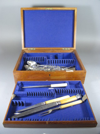 An oak canteen box containing silver plated flatware