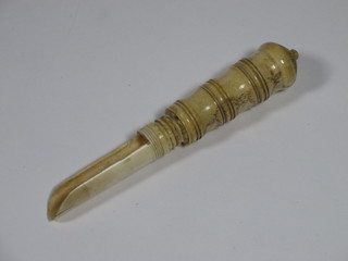A turned ivory marrow scoop 2.5"
