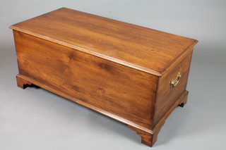 A George III style oak blanket box with hinged moulded top  raised on shaped bracket feet 21.5"h x 49"w x 24"d