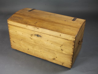A pine dome topped trunk with steel handles 21"h x 38"w x  19"d