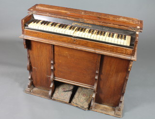 A 19th Century oak pedal organ by James Hallett 126 Green  Street 32"h x 39"w x 14"d