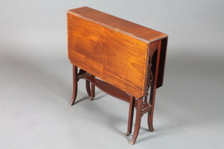 A late Victorian mahogany Sutherland table, satinwood crossbanded and raised on pierced end supports and splayed legs  27.5"h x 34"w x 27"d