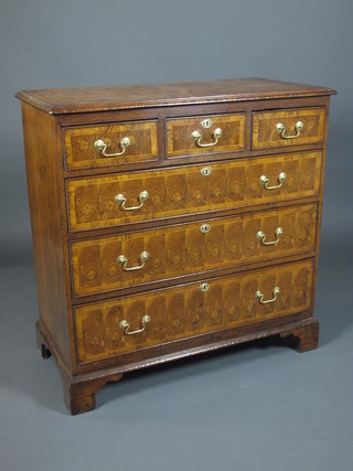 An early George III walnut and oak chest, oyster veneered and crossbanded, fitted 3 short above 3 graduated long drawers on  shaped bracket feet, altered and formerly the upper section of a  chest on chest, 41"h x 41"w x 20"d