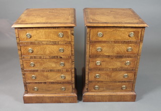 A pair of George III style walnut chests, cross and feather banded, fitted 5 long drawers raised on plinth bases 31"h x 20"w  x 19"d