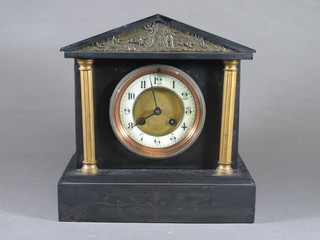 A Victorian slate mantel clock of architectural form, the  pediment decorated hunting scene above an Arabic porcelain  chapter ring, set 8 day movement, chiming gong and flanked by a  pair of reeded columns raised on a plinth base 10"h x 9.75"w x  6"d