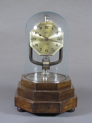 A 1930's Bulle electric clock under a glass dome with silvered  Arabic dial on stepped octagonal base 11"h x 7"w
