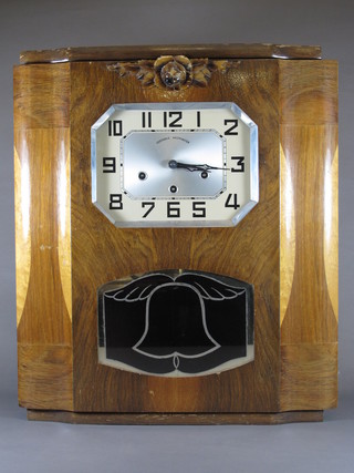 A 1930's walnut Veritable Westminster wall clock having an Arabic painted dial set 8 day movement, Westminster chime on 8  gongs 22.5"h x 19"w x 7"d