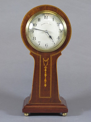 An Edwardian mahogany balloon cased mantel timepiece with  silvered Arabic dial with outer minute track, decorated marquetry  bell flowers on a plinth base, retailed by Walker & Hall Ltd  10.75"h x 5"w x 3.5"d