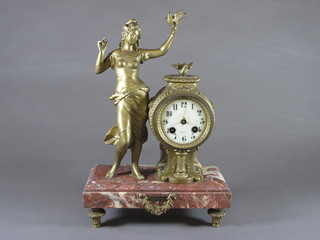 A mid 19th Century French gilded spelter figural mantel clock decorated the young "Fauvette" in diaphanous robes, holding a  song bird flanking a drum cased Arabic enamelled dial, set 8 day  movement with count wheel strike on bell, signed Japy Freres &  Co, raised on a rouge marble base, toupee feet 15"h x 10"w x  5.5"d