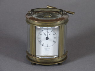 A 20th Century French brass drum cased miniature carriage timepiece with Roman enamelled dial, set platform escapement  4"h x 2.75"w