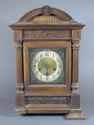 A late Victorian walnut cased bracket clock of architectural  form, having painted Arabic dial with breguet numerals, set 8  day 2 train movement chiming gong 18"h x 12"w x 9"d