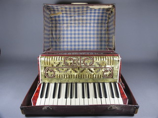 A Carlo Rossi Italia bass vintage piano accordion with 60 buttons, cased