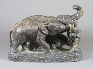 After Barrie, a bronze figure group of elephants 10"
