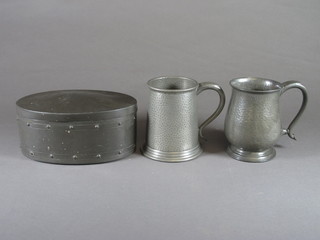 An oval English pewter trinket box 8" and 2 pewter tankards