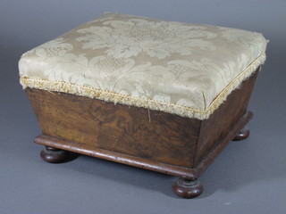 A 19th Century figured walnut footstool, having foliate damask upholstered top, raised on flattened bun feet 10.5"w x 6"h