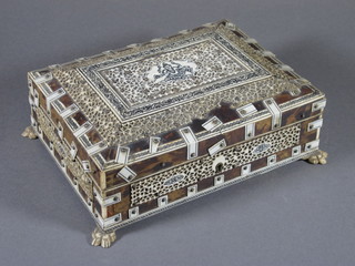 A "tortoiseshell" and ivory mounted trinket box with hinged lid 8.5"